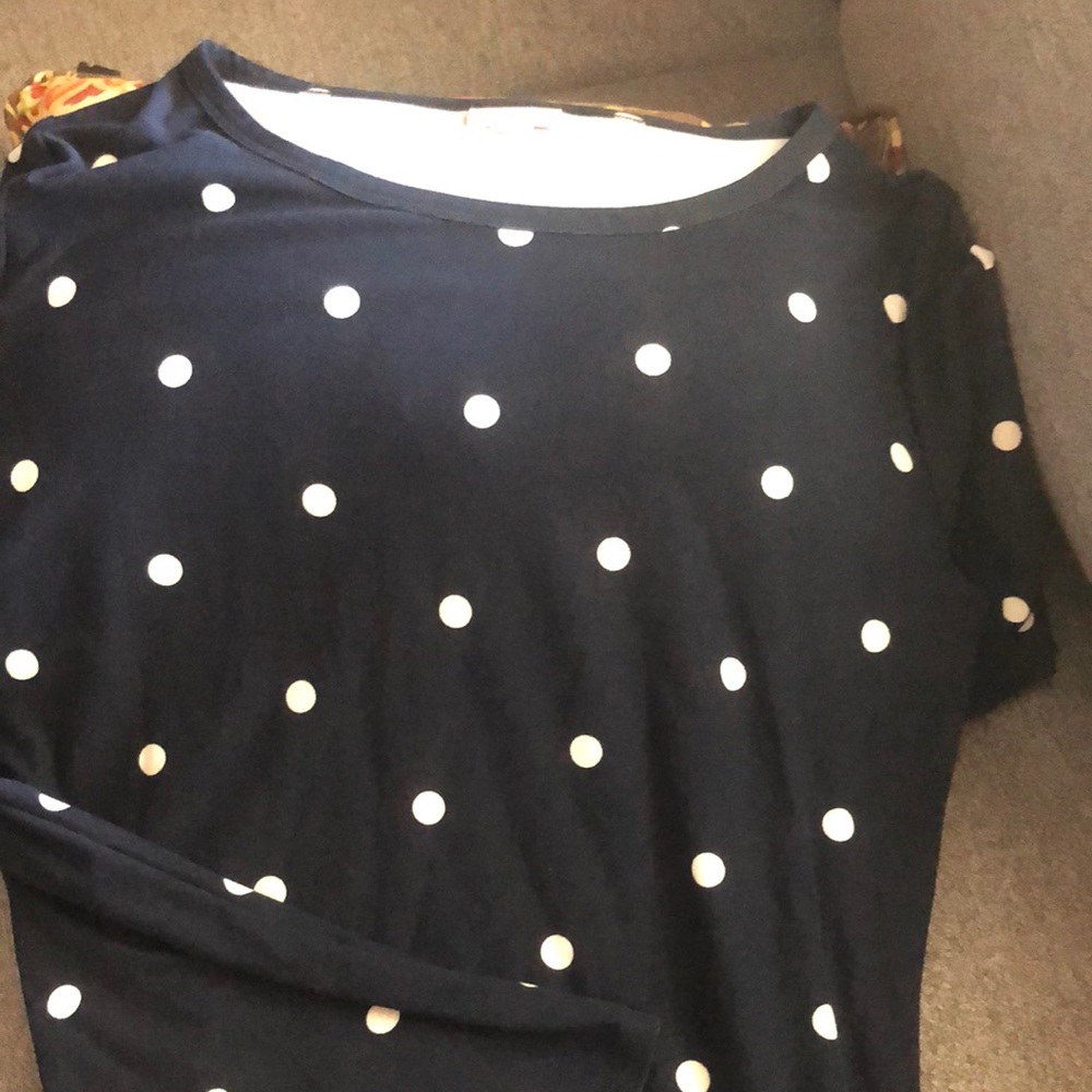 Navy, white dots t shirt material. Very soft. Cute